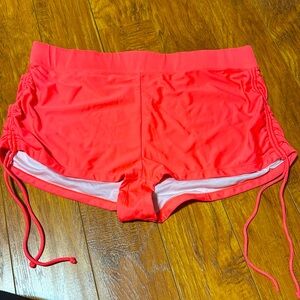 Neon pink swim shorts